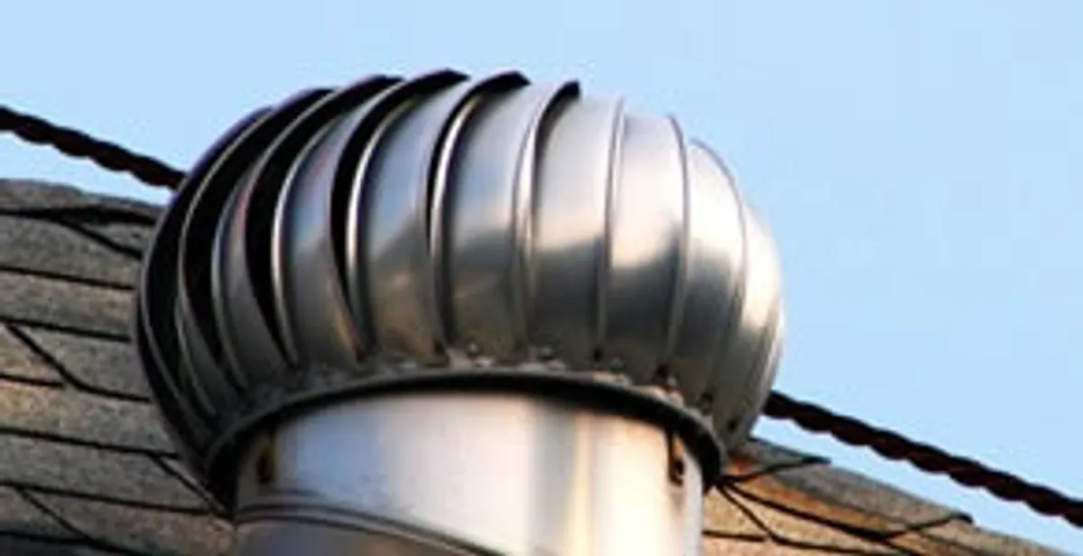 attic fan installation services with professionally installed roof ventilation unit in Boston, MA