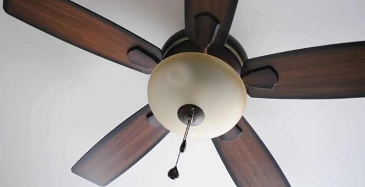 Fully installed ceiling fan with balanced blades and light fixture in Boston, MA