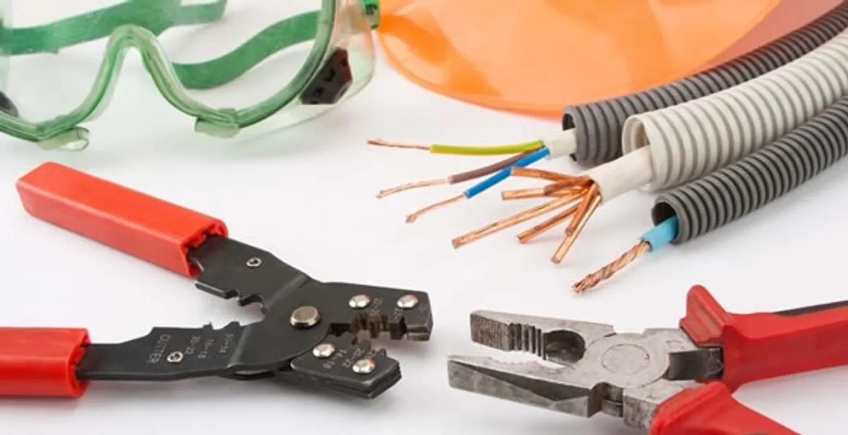Electrical wiring repair with professional tools and safety equipment in Dorchester Center, MA