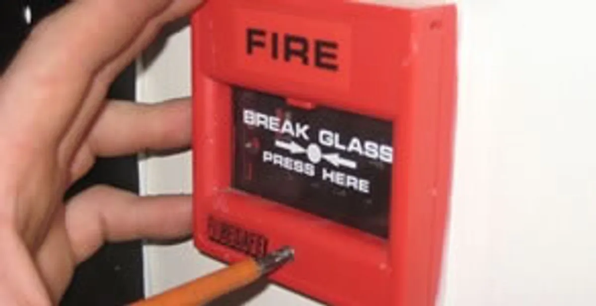 fire alarm installation service showing manual fire alarm pull station installed by licensed electricians in Boston, MA