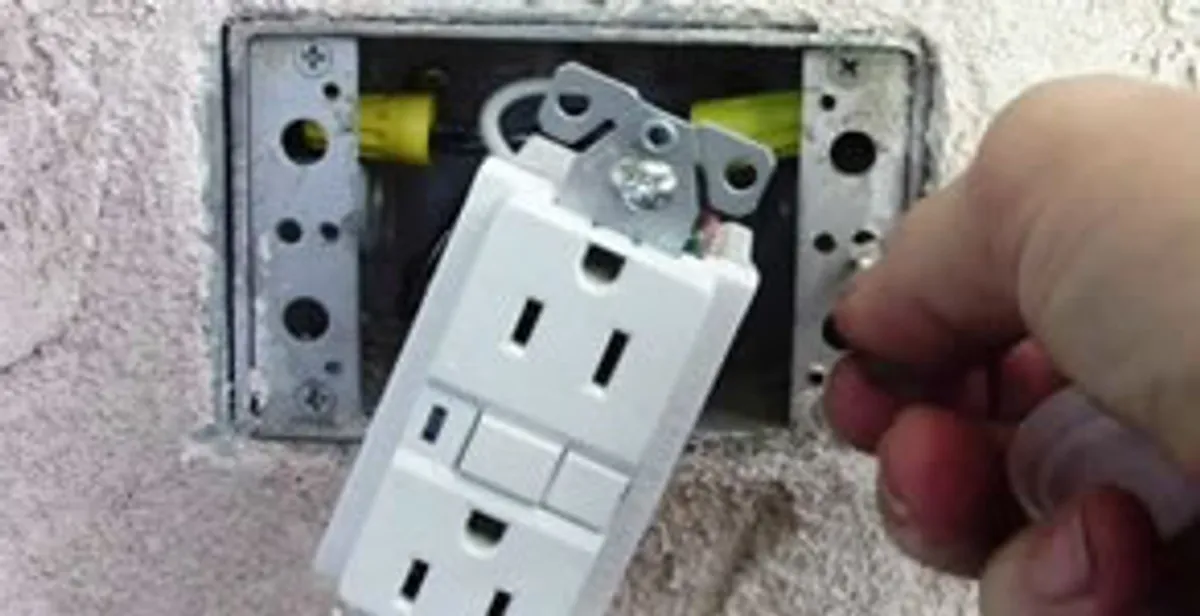 gfci circuits service showing installation of a ground fault circuit interrupter outlet by licensed electricians in Boston, MA