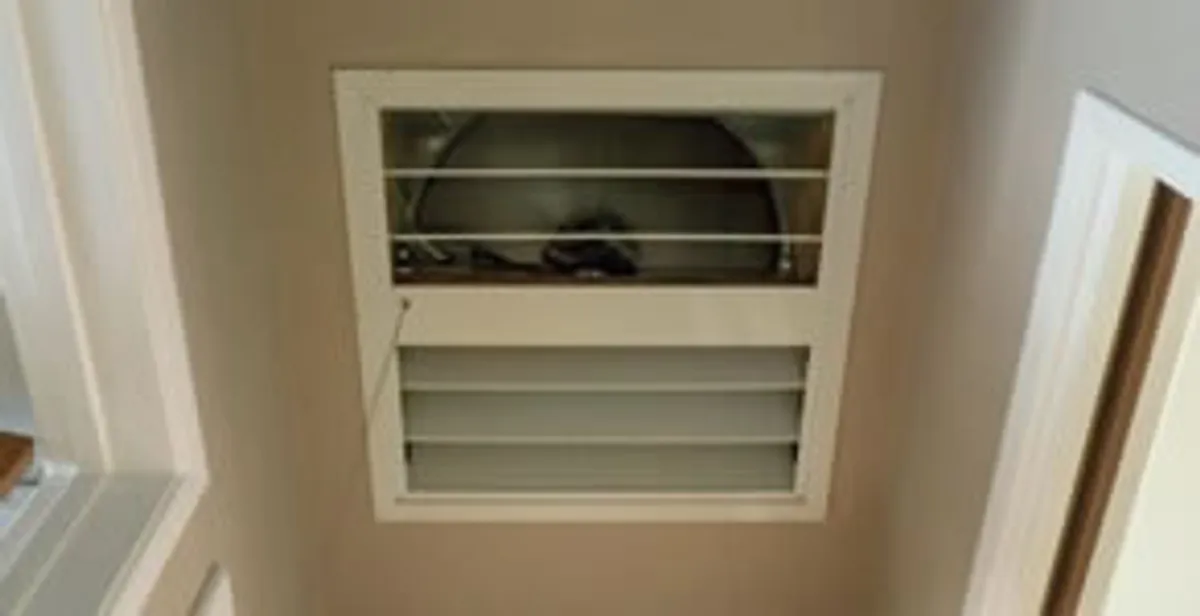 whole house fan installation services with ceiling-mounted ventilation system in Boston, MA